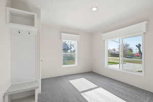 Mudroom with carpet and recessed lighting