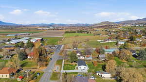 View of property location with a mountain backdrop and rural landscape