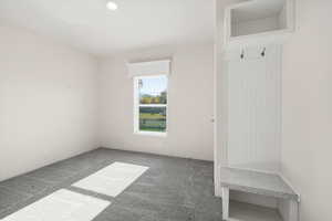 Mudroom featuring carpet and recessed lighting
