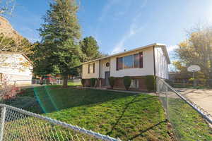 Bi-level home with brick siding