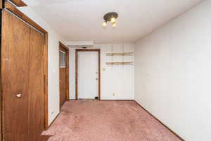Room that could be used as family room or another large bedroom. Door to outside.