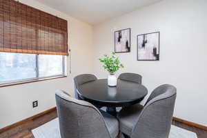 Dining room featuring wood finished floors