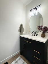 Bathroom with vanity and light tile patterned floors