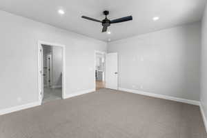 Unfurnished bedroom with light colored carpet, recessed lighting, a ceiling fan, and connected bathroom