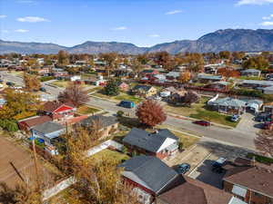 Aerial perspective of suburban area featuring a mountain backdrop
