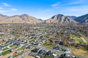 View of property location with nearby suburban area and a mountain backdrop