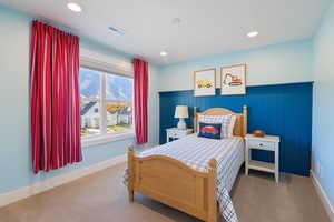 Bedroom with carpet flooring and recessed lighting