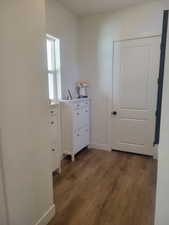 Interior space with light wood finished floors and baseboards