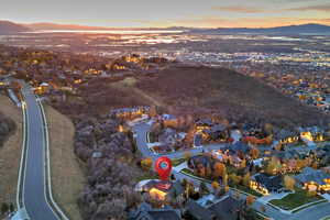 Aerial view at dusk of a residential view and a mountain view