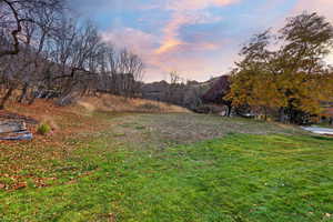 View of green lawn with a view of countryside
