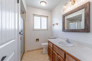 Master Bathroom with vanity and a stall shower