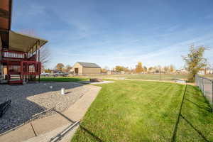 View of yard featuring stairway