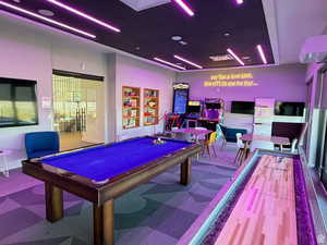 Recreation room with billiards table