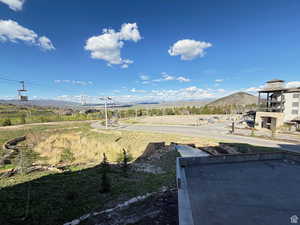View of yard with a mountain view