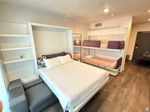 Bedroom featuring wood finished floors