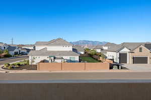 Mountain view featuring nearby suburban area