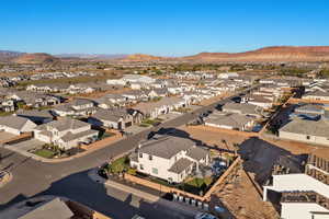 Aerial view of residential area featuring mountains
