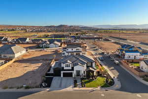 Aerial view of residential area with a mountainous background