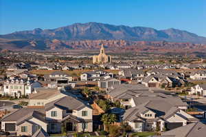 Aerial view of residential area with a mountainous background