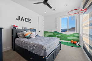 Bedroom featuring carpet floors, recessed lighting, and a ceiling fan