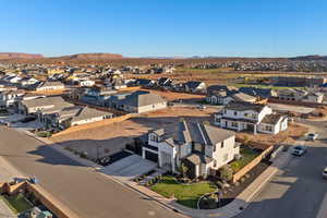 Aerial view of residential area featuring a mountainous background