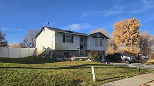 View of front of home with brick siding front porch area and concrete driveway
