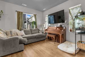 Living room with light wood finished floors