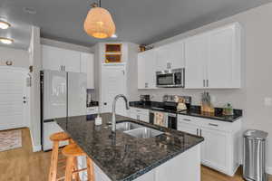 Stylish White Cabinets with Granite Counters