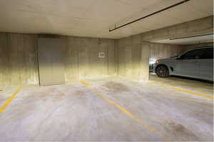 View of parking stalls in covered secured garage.  Garage is on the same level as unit 408.