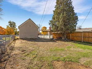 View of fenced backyard