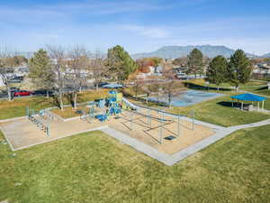 View of community with a yard, a residential view, a mountain view, and a gazebo