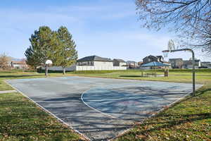 View of sport court with community basketball court and a residential view