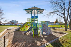 Community playground with a lawn