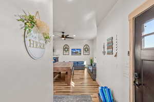 Hall with recessed lighting and light wood-style floors