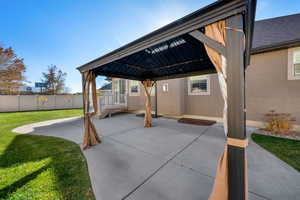 View of patio featuring a gazebo