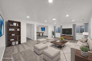 Living room featuring light colored carpet and recessed lighting