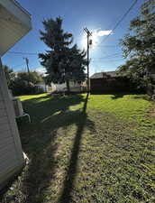 View of fenced backyard