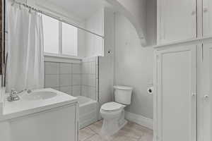 Bathroom featuring vanity and shower / bath combo