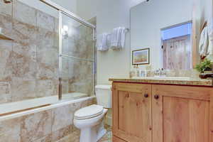 Full bathroom featuring vanity and tiled shower / bath