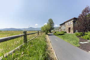 Surrounding community featuring a view of countryside and a mountain view