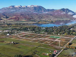 Developed land parcels featuring a paved road infrastructure and marked lot boundaries