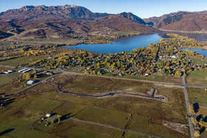Expansive land parcel featuring a newly paved cul-de-sac and direct road frontage