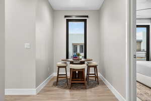 Dining area featuring light wood-type flooring
