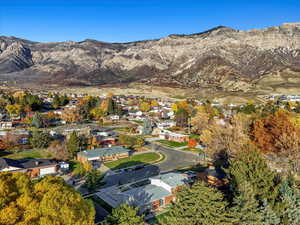 View of property location featuring nearby suburban area and mountains