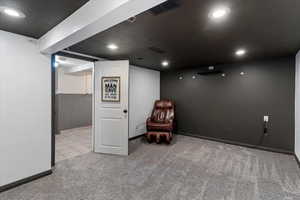 Bedroom or theater room with attaches officce/closet