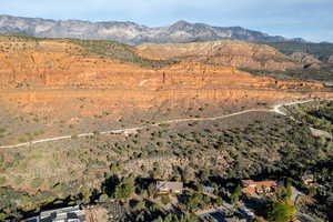 Aerial overview of property's location with a mountain backdrop