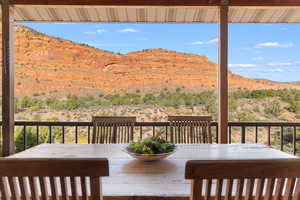 Wooden deck featuring a mountain view