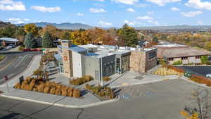 View of property with a mountain view