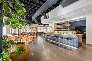 Bar area featuring recessed lighting