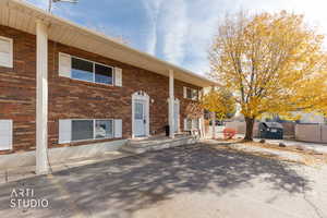 Split foyer home with brick siding